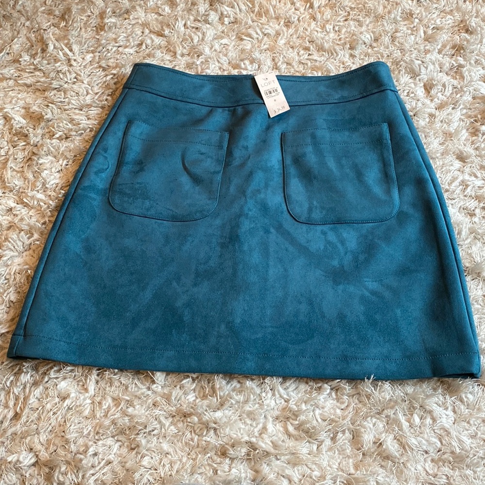 Faux suede, teal color mini skirt. 18’